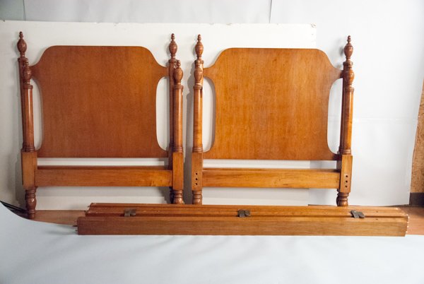 Pair of Reproduction Maple Twin Beds: Pair of Reproduction Maple Twin Beds With rook Headboards 43 1/4" H x 39 1/2" W Provenance: The estate of the late Honorable Robert W. Daniel, Jr. of Brandon in Prince George, VA