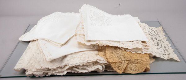 Lot of Linens: Lot of Linens To include banquet size lace tablecloth with some staining, Set of ten(10) lace edged napkins monogrammed CBD, Nine(9) napkins monogrammed RWD, eighteen napkins without monogram. Provena