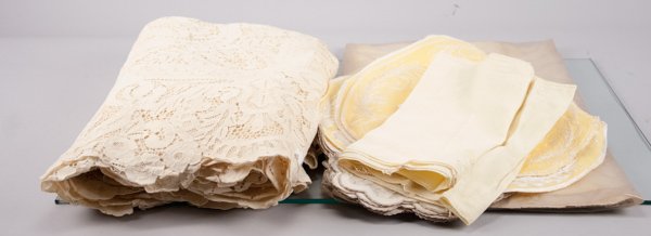 Box Lot of Linens: Box Lot of Linens To Include Lace Tablecloth, Assorted Napkins and Table Runners Provenance: The estate of the late Honorable Robert W. Daniel, Jr. of Brandon in Prince George, VA