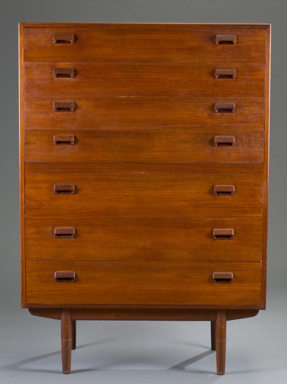 Borge Mogensen Teak Chest: Danish (b. 1914-1972). Designed for Soborg Mobler, model no. 16030, ca. 1965. Rectangular top with seven drawers, raised on four tapering cylindrical legs. 57" H x 39 1/2" W x 18" D