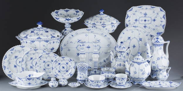 Royal Copenhagen Dinner Service: One-hundred and twenty five (125) pieces in total. Blue lace pattern. Marked on bottom. Specific Pieces:1 square platter, 2 small ovular platters: 9 1/2'' L x 5'' W, large ovular platter: 11 3/4'' L x