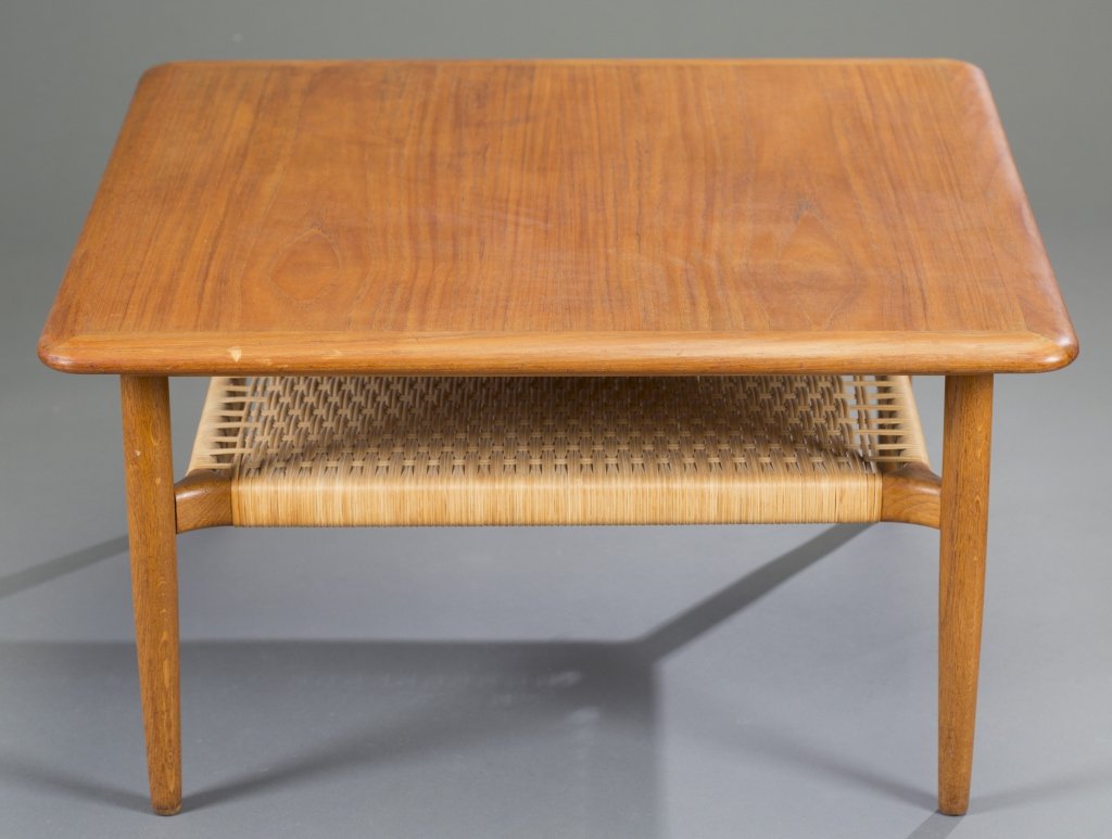 Peter Hvidt & Orla Mølgaard Teak Table: Woven cane lower shelf. 16 1/2" H x 31" L x 31" W