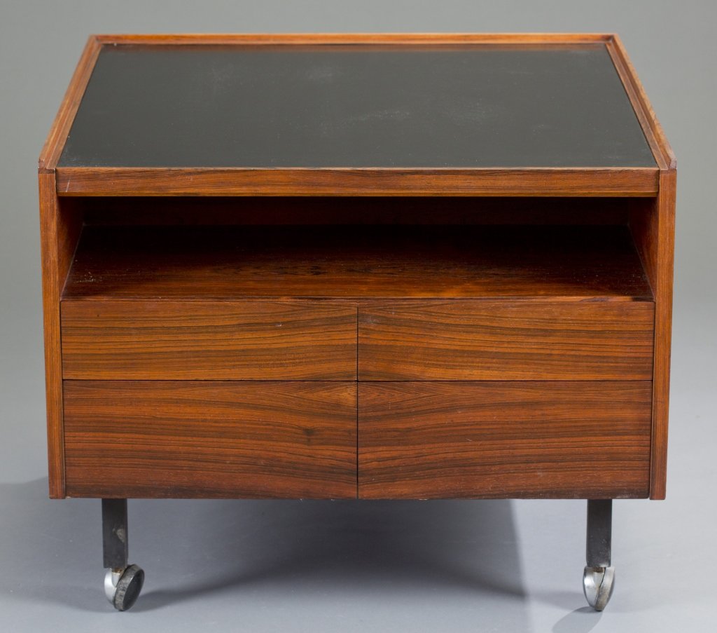 Rosewood Mobile Coffee Table: Unmarked. Sliding black top reveals two stepped shelves. Four drawers on front. Black painted metal legs and wheels. 24" H x 29" L x 29" W