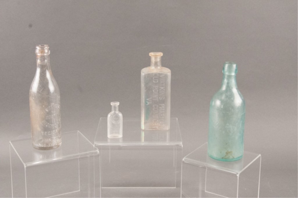 Collection of Four Glass Bottles: Including, Hunter Booker, Hampton, VA, Merritt Moore , Jr., Hudgins, VA, a Hampton, VA botlle and Comfrot, VA bottle.