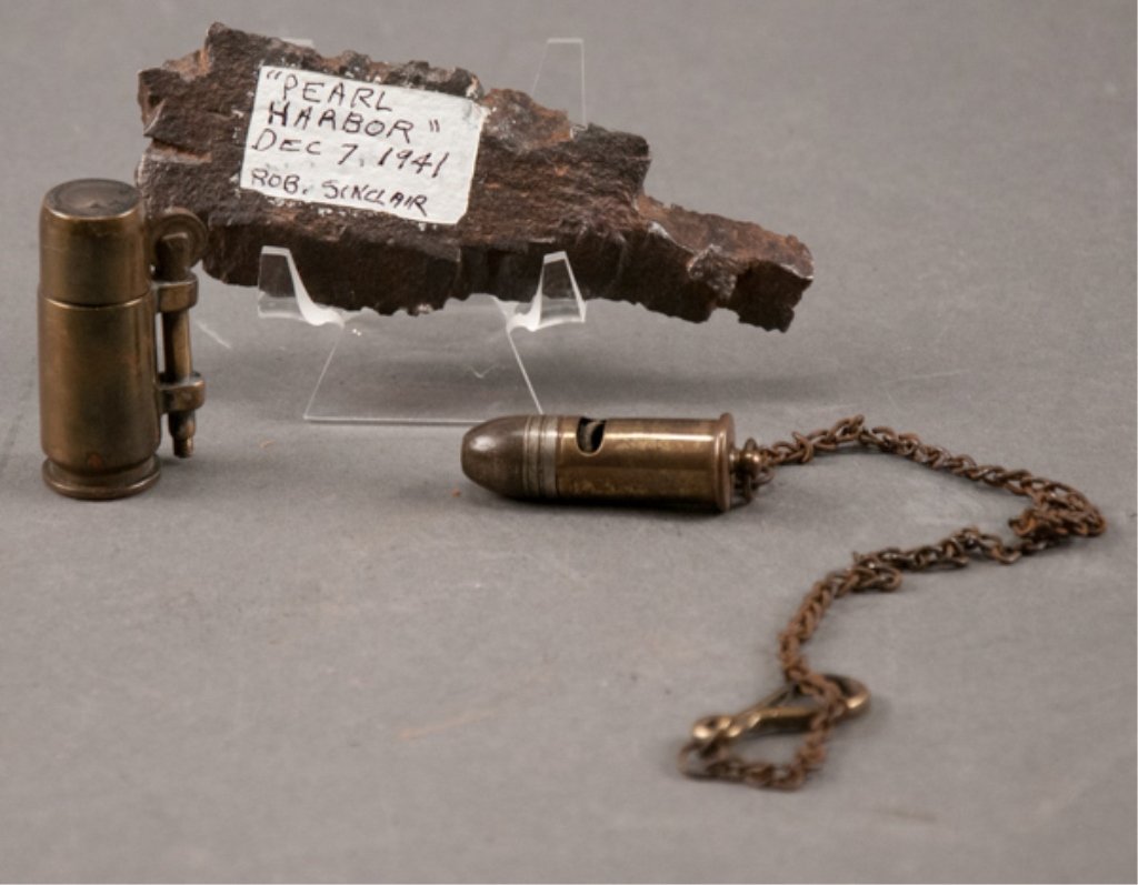 Brass Lighter, Whistle and Pearl Harbor Shrapnel: Trench art brass lighter and whistle made from shell casing marked Pat. Nov. 29 1881 and a piece of shrapnel marked Pearl Harbor, Dec. 7 1941 Rob Sinclair. Minor wear. Largest 5" long.