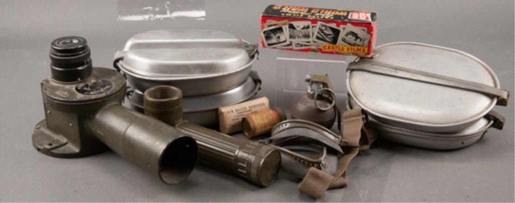Group of US Military Items: To include: 1917 and 1918 mess kits, 1944 and 1945 mess kits. Deactivated baseball grenade, flashlight, part to a range finder and a group of Castle Films WWII slides. Wear,scratches and rust to all. 