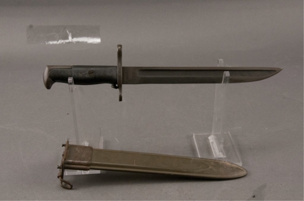US Model 1905 E1 Bayonet: Dated 1917. Parkerized blade is excellent. Scabbard shows minor wear and rust. Blade: 10" Overall: 15 3/4"