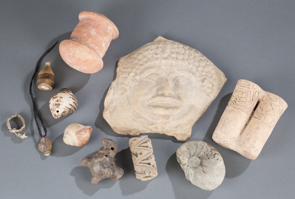 Assortment of Pre-Columbian Artifacts: Including painted rattle, two sheels, a roller stamp, and variety of objects.