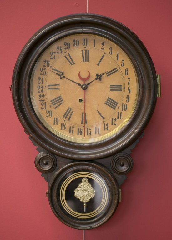 Victorian Calendar Wall Clock: No maker's name visible (possibly by Charles F. Adams of Erie, PA). 24" H x 16" W