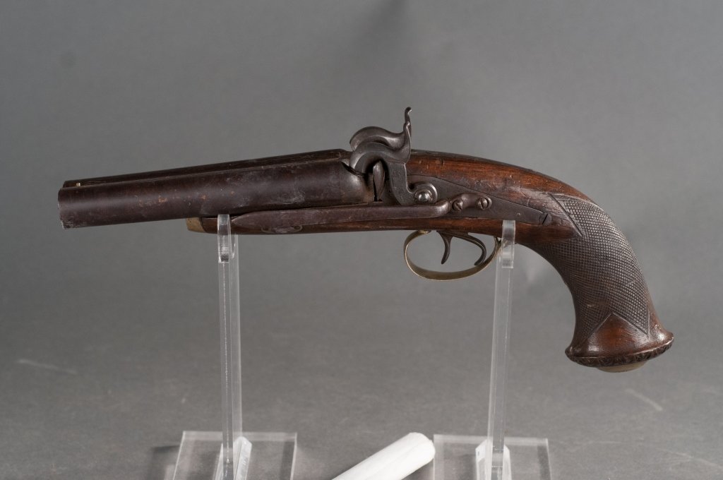 Ca. 1850 CSA Double-Barrel Percussion Pistol: No serial. Approximately .58 caliber. European manufacturer (probably English). All brown with nickel silver-engraved furniture. Has belt hook added to left side. One nipple broken. One hammer will no