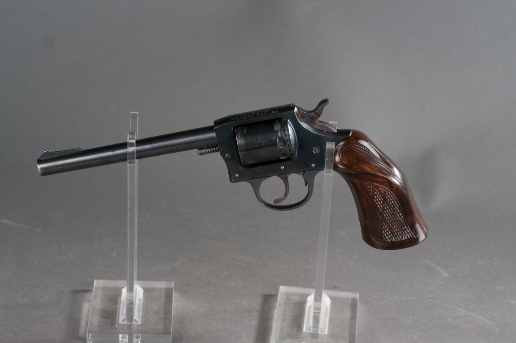 Iver Johnson Model 55 .22 Target Revolver: Serial #C27744. Overall 97% finish. Grips are very good with minor wear.. Bore is very good. 6" barrel. 11" overall. Provenance: The Estate of Walter T. Price, Jr. of Orange, VA.