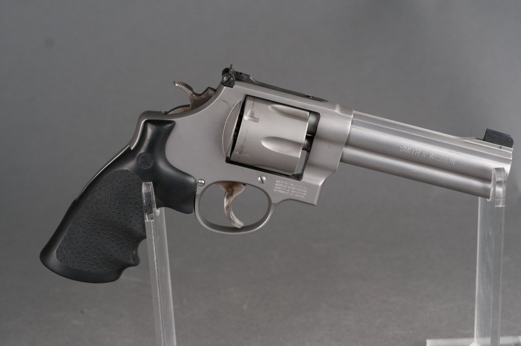 Smith & Wesson Model 625-8 .45 ACP Revolver: Serial #CHV6030. Overall 98% with scratches on muzzle. Grips and bore are excellent. Includes original box. 5" barrel. 10.5" overall. Provenance: The Estate of Walter T. Price, Jr. of Orange, VA.
