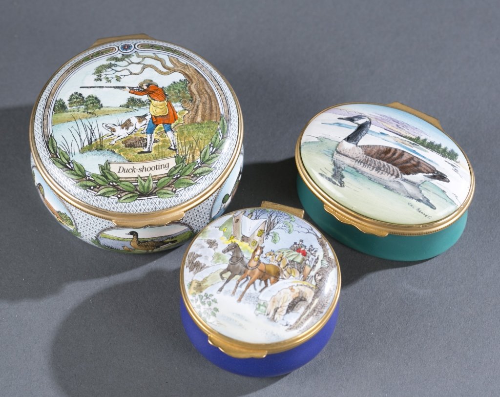 Three Enameled Porcelain Pill Boxes: Includes Halcyon Days "Duck Shooting", Harrods Christmas Box Limited Edition and Halcyon Days Canadian Goose. Provenance: The Estate of Robert V. Hatcher, Jr. of Manakin-Sabot, VA.