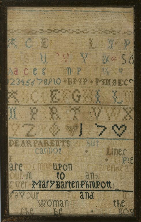 Sampler By Mary Barton Philpott: Sampler displaying full upper and lower case alphabets in different stitch patterns, numbers and writing to her parents. Overall wear due to age. Framed under glass. Includes membership application to