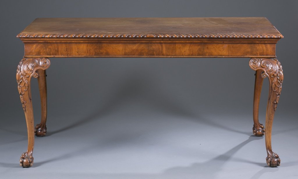 20th c. Console Table: Gadroon border with heavily carved acanthus leaf knees, shaped legs resting on claw and ball feet. Label on underside, "Smith & Watson / Antiques, Furnishings, Decorations / New York" 31" H x 56" L x