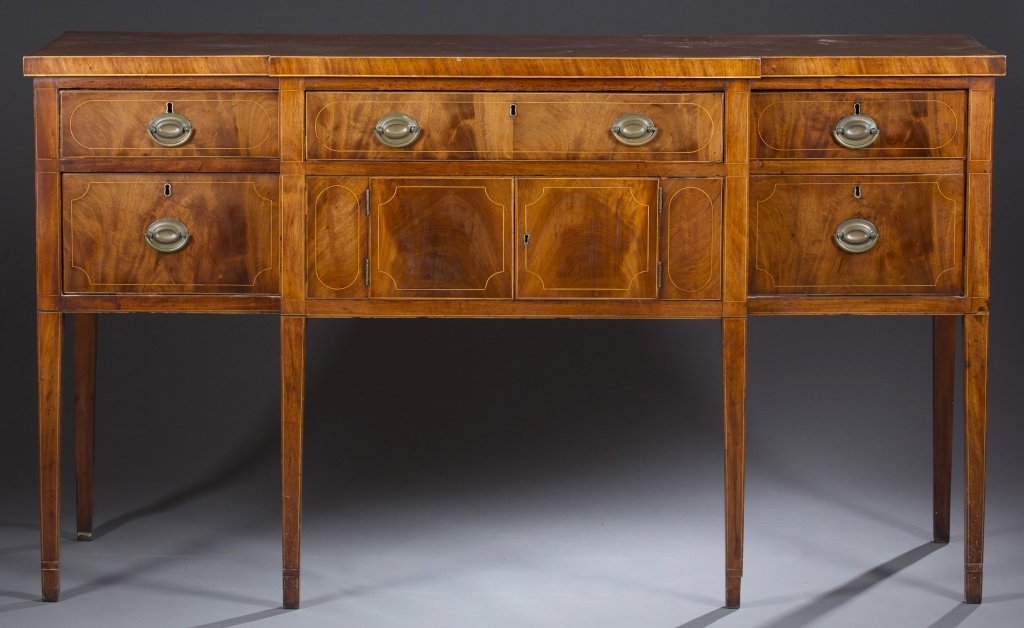 Late 18th c. Mid Atlantic Sideboard: Mahogany with white pine and poplar secondary. Diminutive proportions with three central cabinets, all with satinwood line inlay. Rests on straight tapered legs Refinished. 39 1/2" H x 69" L x 24 1/4"