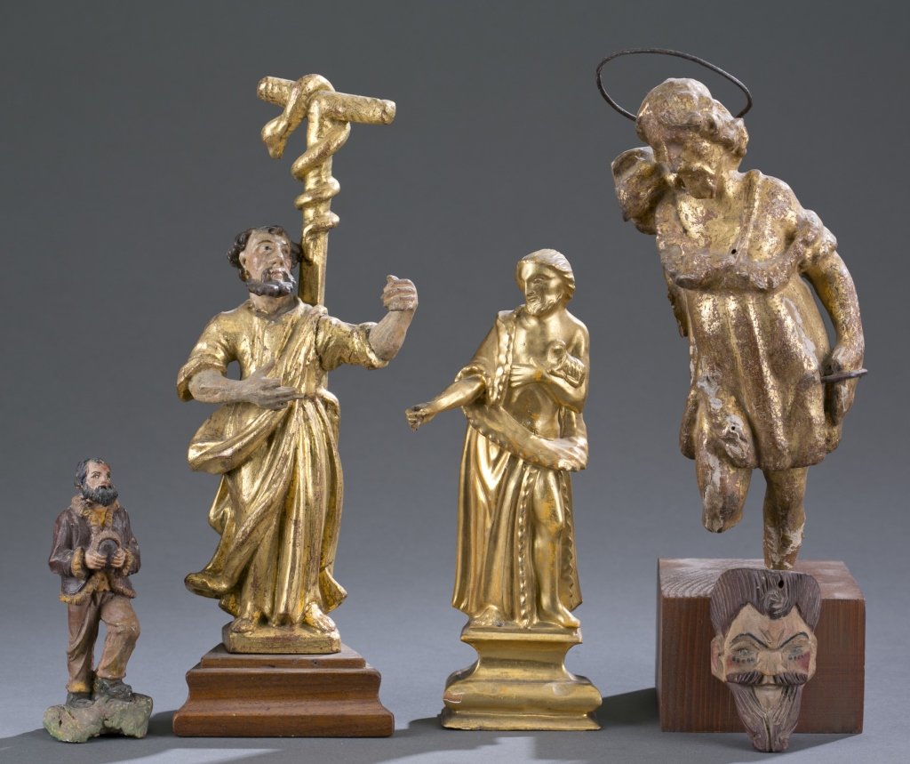 Assortment of Five Santos Figures: Including a wooden and gilt painted Saint John, a wood carved and painted figure of Moses, a wood carved and gilt figure of Christ with wire halo, a polychrome wood peasant and a wood carved mask. Tal
