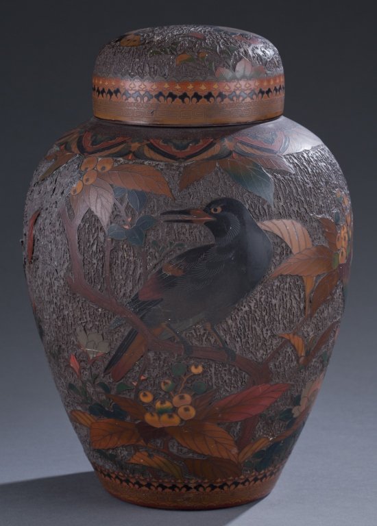 Ca. 1910 Japanese Lidded Urn: Enamel on Arita porcelain. Central crow with floral and butterfly decoration. 13" H