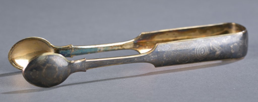 Russian Silver Gilt and Niello Sugar Tongs: Possibly by Mikhail Mikhailovich Karpinskiì, Assayer's mark from 1870. Floral decoration with monogram at curve.