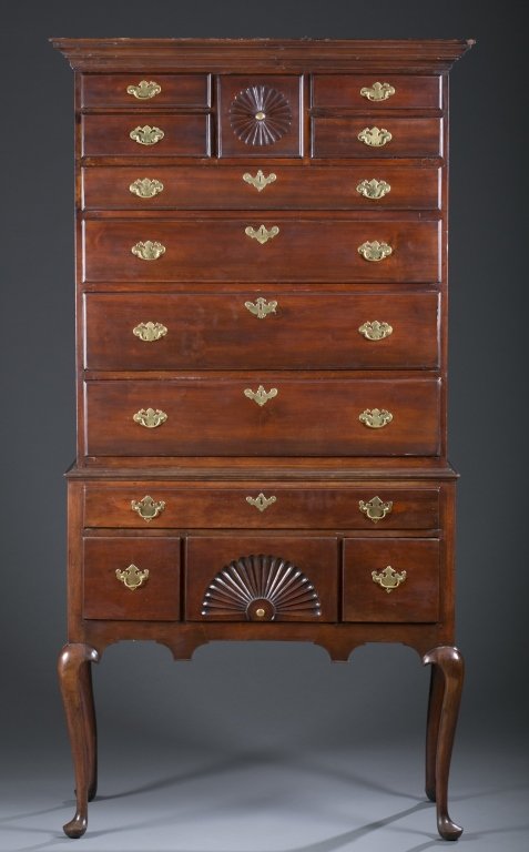18th c. Pennsylvania Highboy: Cherry with poplar secondary. Five-over-four dovetail construction drawers, one with fan carving, resting on lower mortise and tenon pined frame with one drawer over three smaller drawers all on grace