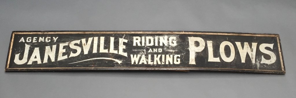 19th c. Janesville Plows Painted Wooden Sign: Advertisement sign for Janesville Plows.