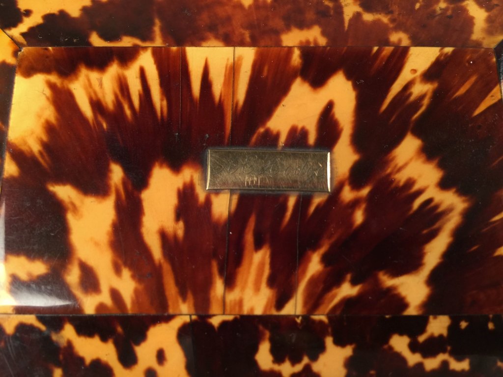 English Tortoiseshell Box and Sewing Implements: Monogrammed "A. E. Hodge", 19th century. Velvet lined interior with fitted gold plated tools. English Assay's mark on monogrammed snuff box. Minor wear, and one chip on top of left corner of box. 1 3/