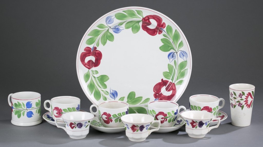English Ironstone Stick Spatter Dishes: Fourteen pieces of English Ironstone Stick-Spatter Dishes, each painted with bands of stylized flowers in the "Virginia" pattern. Some have stamped mark on base. Include: One serving platter, 14" L Fo