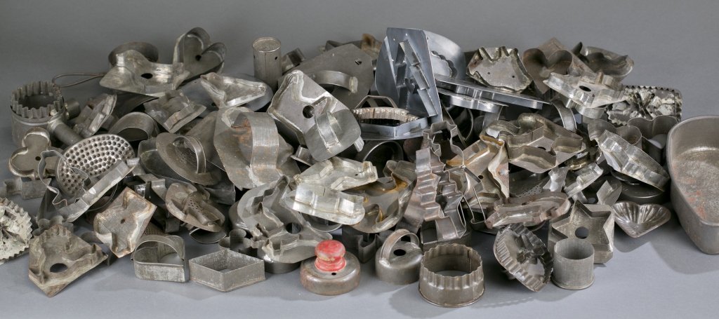 Tin Figural Cookie Cutters and Heart Pan: An assortment of tin figural cookie cutters of various sizes handmade, some with handles, includes but not limited to: hearts, rabbits, birds, deer, sheep, geese, camel, apple, pineapple, elephant, Ch