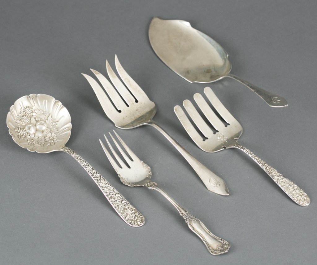 Group of Five Sterling Silver Serving Pieces.: ++ 1847 Roger's Bros serving fork. ++ Cake Server with maker's mark. ++ Jenkins & Jenkins serving fork. ++ Large serving fork, same maker's mark as the cake server. ++ S. Kirk & Son Co heavily repouss