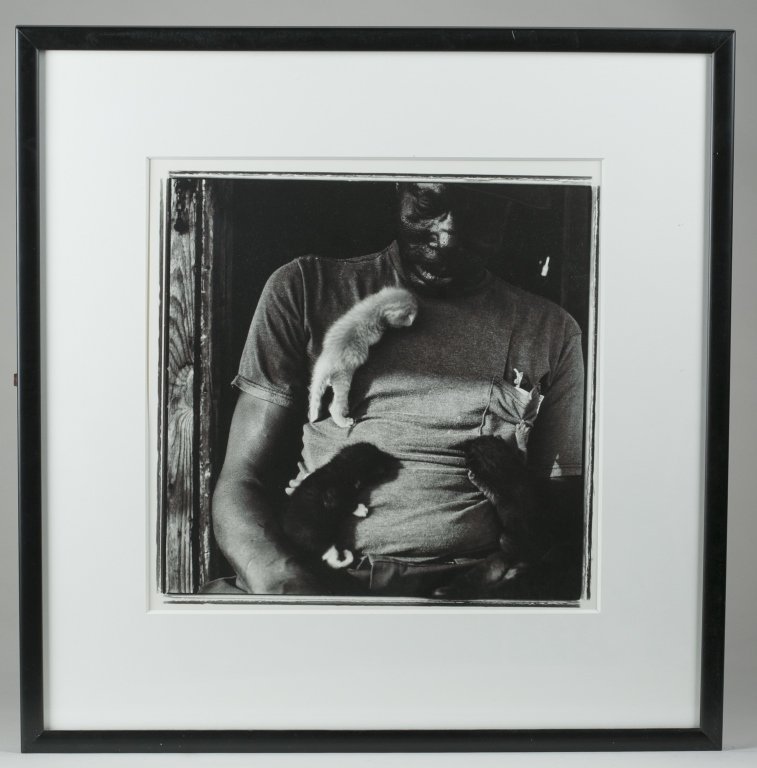 Keith Carter (US/Wisconsin, b. 1948).: Raymond" c. 1991. Gelatin silver print. 25 1/2" x 24 3/4.