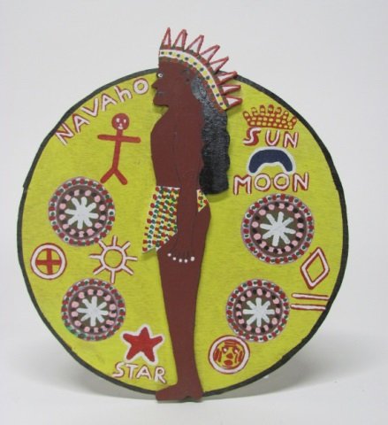 James Harold Jennings (North Carolina, 1931-1999).: "Navaho Sun Moon Star". 1992. Polychrome painted wood wall sculpture. On back, signed and dated. 16"diam.