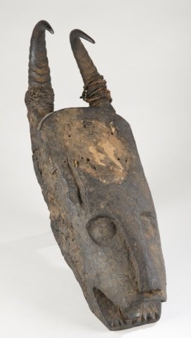 African Carved Wood Mask, 20th c.: Carved wood mask with antelope or goat antlers. 20 1/2" h.