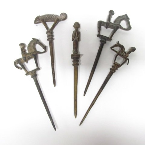 Five African Brass Ornaments.: Kneeling man ++ Three horseback riders ++ Chameleon ++ Largest: 7 1/2" l.