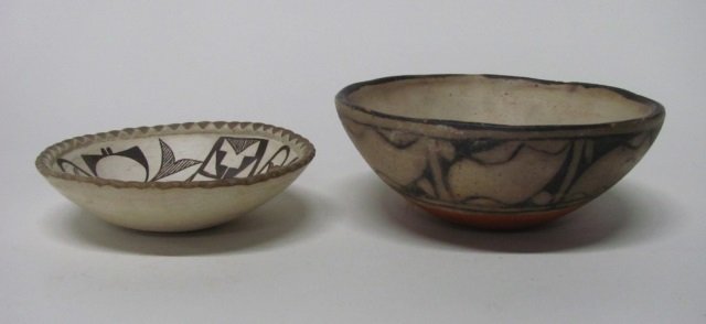 Two Polychrome Southwest Native American Bowls.: Polychrome bowl. Initialed on bottom "E.G.C." 3" h. x 7 3/4" diam. ++ Polychrome bowl with scalloped and cut detail on rim. 1 3/4" h x 6 5/8" diam.