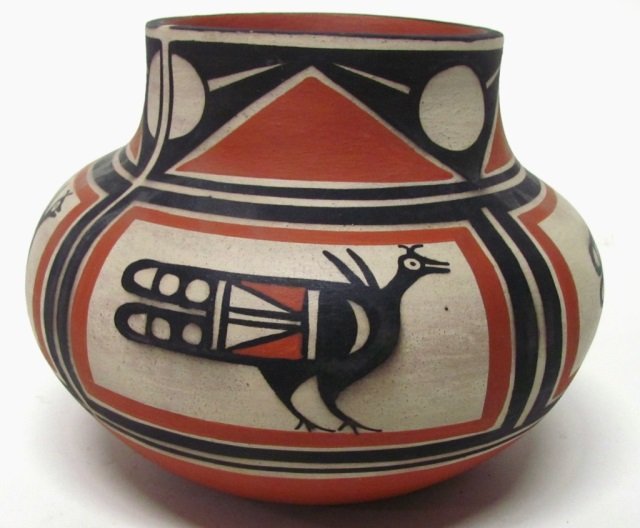 Robert Tenorio (Santo Domingo Pueblo, NM, b. 1950): Polychrome painted vase. Designed with traditional designs and a roadrunner. Incised signature on bottom. 7" h x 8 1/2" diam. Featured in, "Trading Post Guidebook: Where to find the Trading Posts, Gal