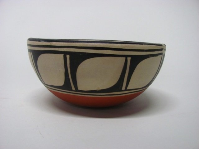 Robert Tenorio (Santo Domingo Pueblo, NM, b. 1950): Polychrome bowl with traditional designs. Signed "Robert Tenorio Santo Domingo Pueblo, NM. 4" h x 8" diam.