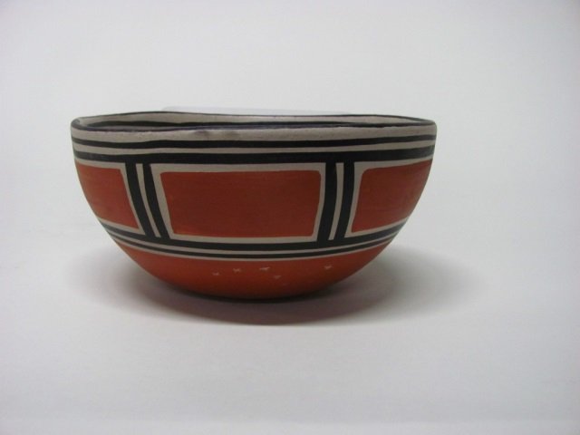 Robert Tenorio (Santo Domingo Pueblo, NM, b. 1950): Polychrome bowl with geometric design on exterior and antelope design on interior. Signed "Robert Tenorio Santo Domingo Pueblo, NM." 4 1/8" h x 8 1/8" diam.
