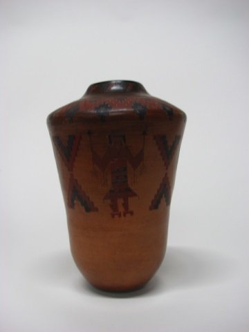 Lorraine Williams (US/Navajo Nation, 20th c.).: Yei'ii pot. Polychrome clay vase with incised traditional geometric designs and stylized Native Americans. Signed on bottom. 14" h. Lorraine is the daughter-in-law of Rose Williams and learned her cra
