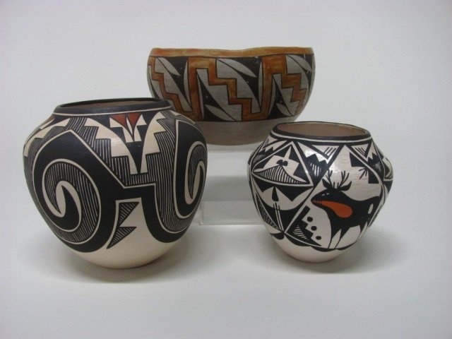 Three Acoma Pueblo Polychrome Vases.: Geometric design vase. Initialed on bottom, MJS. Acoma, NM. 5 1/4" h. ++ Deer design vase. Signed on bottom, W. Garcia. Acoma, NM. 5 1/2" h. ++ Vallo traditional geometric design vase. Signed on botto