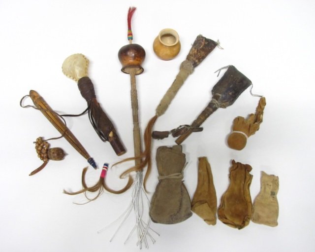 Native American Rattles & Medicine Man Totems.: Carved wood with hand sewn leather. Largest: 13" l.