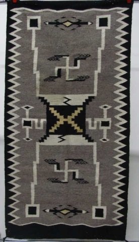 Wool Navajo Storm Pattern Rug.: Storm pattern design in gray, black, yellow, and cream with tumbling logs motif. 56 1/4" x 29".