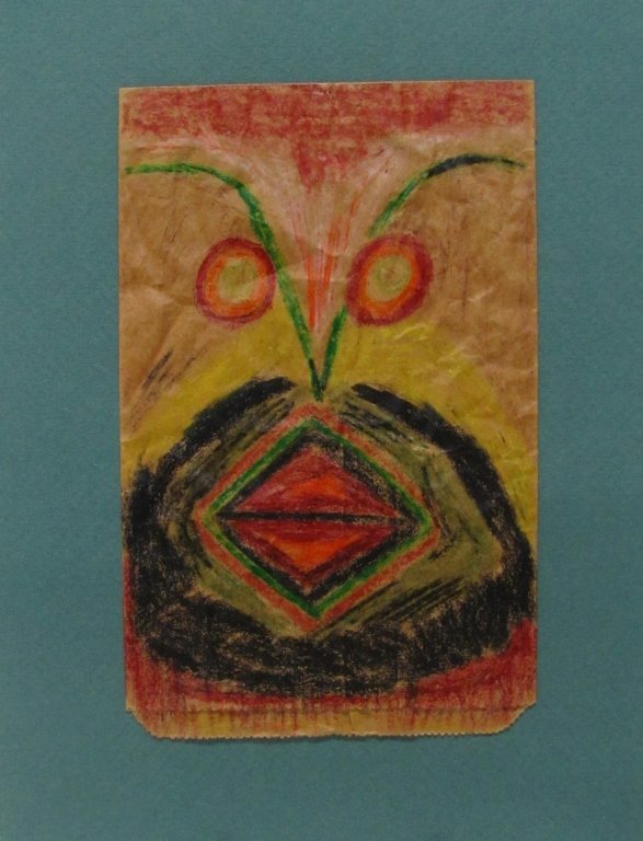 Rafael Ferrer (Puerto Rico/US, b. 1933).: Mask. Dec. 30, 1975. Crayon on paper bag. On reverse, signed/dated and dedicated "for Pat - from Rafi Ferrer." Hinged to mat and framed under glass. 8 7/8" x 5"; frame: 11 1/2" 8 1/2".