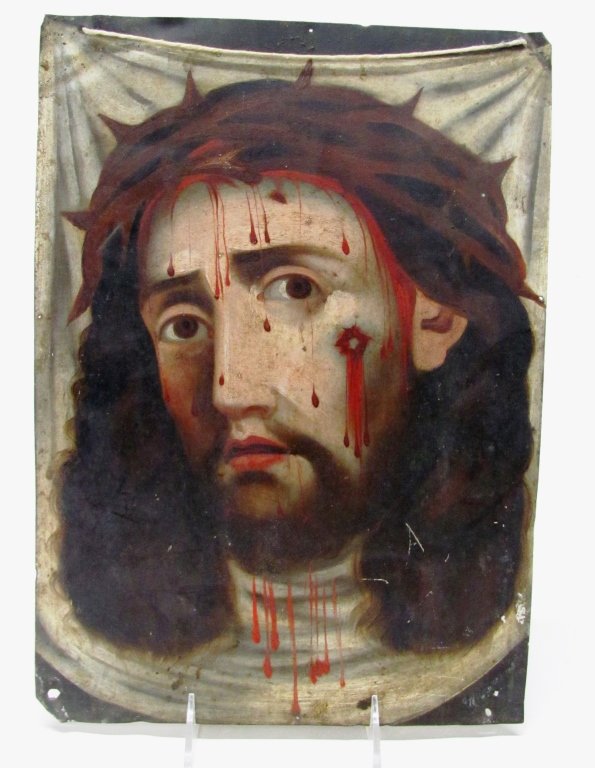 Mexican Retablo "Veil of Verona.": Paint on tin depicting Christ. 14" x 10"