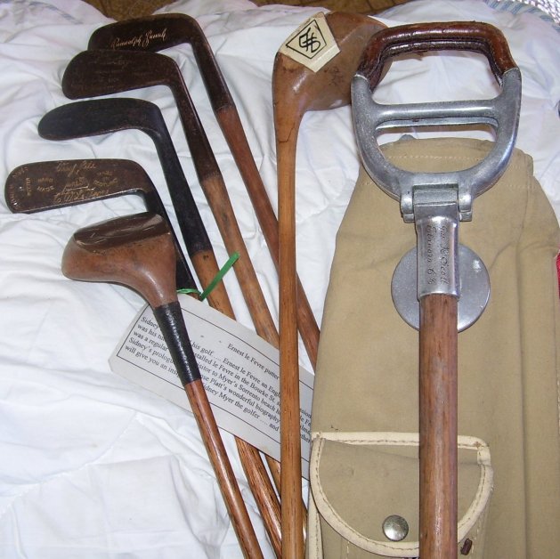 A Bag of History,: An early canvas golf bag with 6 good clubs and a hand-rest engraved Jas Scott, Elenora GC; includesa rare Ernest LeFevre putter, a Carnegie Clark Rose Bay driver, a Walter Hagan 2 Iron, an Ayres Nibli