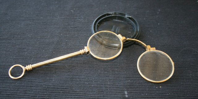 Victorian Gilt Lorgnette: Unmarked but probably silver gilt, modelled in typical form