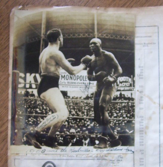 Jack Johnson 1908: Three original photographs by Charles Kerry of the Johnson-Burns Heavyweight title bout at Sydney’s Rushcutter’s Bay Stadium in December 1908, two 15 x 20 ,both noted in the plate as such, both wi