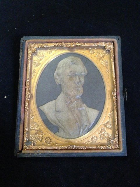 A 19th Century Wax Intaglio of Abraham Lincoln 0: modelled in oval 3/4 bust , with probably rose gold mounts d 5.5