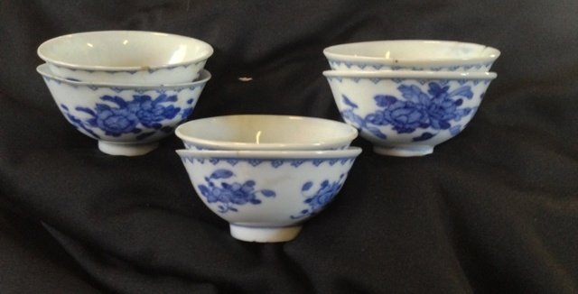A Set of Six Chinese Blue and White Tea Bowls, Possibly: , each modelled with deep bowl, and painted with sprays of flowers, four character mark to base, four AF Provenance Private Collection Hornsby