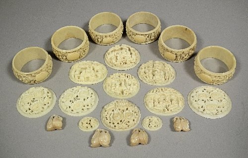 A collection of Chinese carved ivory, including - : A collection of Chinese carved ivory, including - six napkin rings, 1.75ins (45mm) diameter, five oval panels showing figures in a landscape, each approximately 1.75ins (45mm) wide, four similar sized