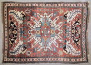 977: An Antique Caucasian rug woven in primary colours 